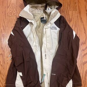 The North Face Brown and Cream Performance Jacket for Outdoor Adventures